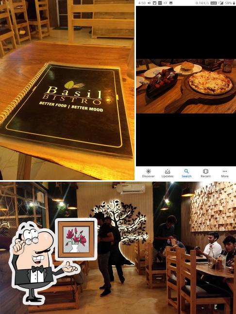 The restaurant's interior and pizza