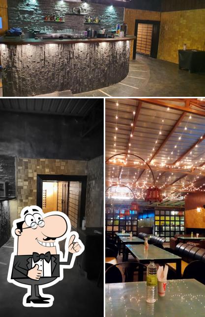 Look at the photo of Ambience Kitchen&Grill