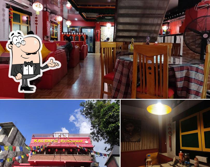Take a seat at one of the tables at Kalsang Cafe and Restaurant
