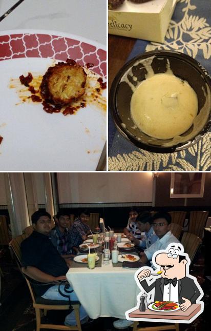 This is the photo depicting food and dining table at Delicacy
