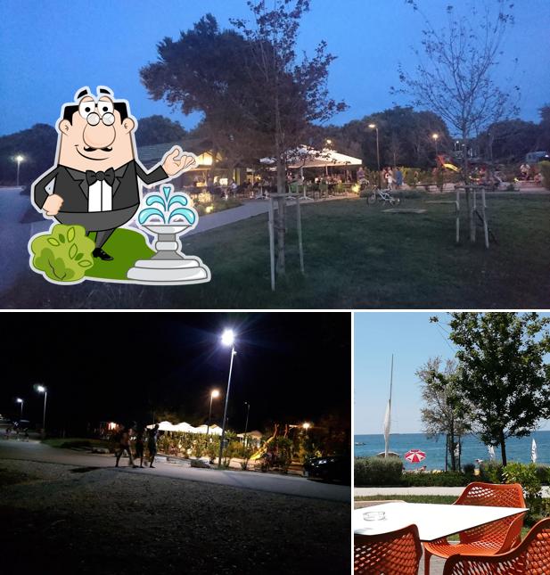 Goditi la vista dall'area esterna di Restaurant Porto Bus