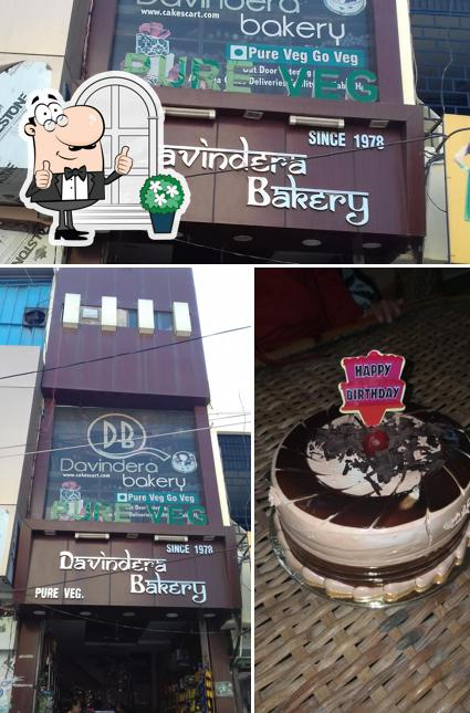 Check out the picture showing exterior and cake at Davindra Bakery