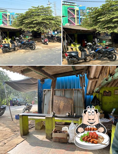 The photo of Aishwarya Hotel’s food and exterior