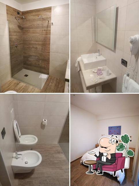 Siediti a un tavolo di Hotel Ristorante Vecchia Maremma