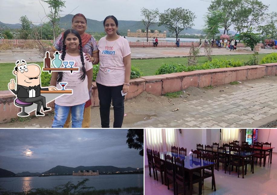 Take a seat at one of the tables at Jal Mahal