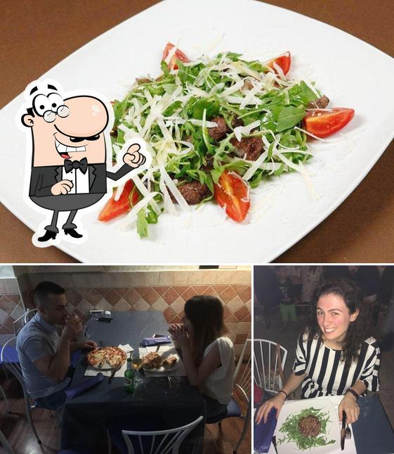 La immagine di interni e frutti di mare da Pub Tony's 999