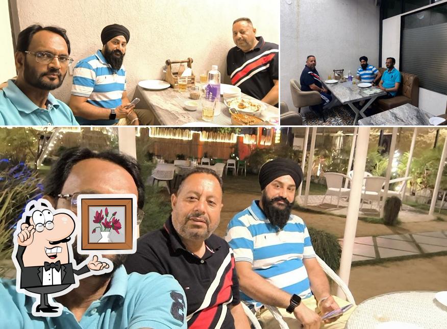 Take a seat at one of the tables at Rabi Dana Pani Tajpur