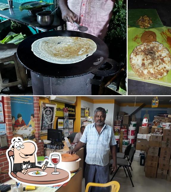 This is the photo displaying food and interior at Night இட்லி Hotel