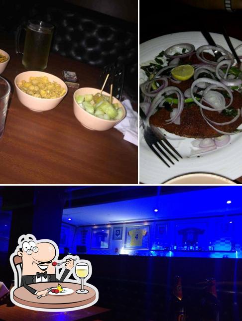 The image of food and bar counter at Turf Pub - Eldoris