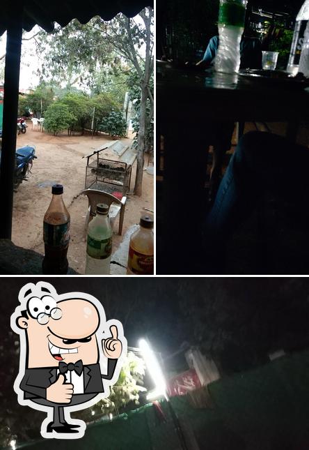Look at the picture of ARAVIND FIMILY DHABA