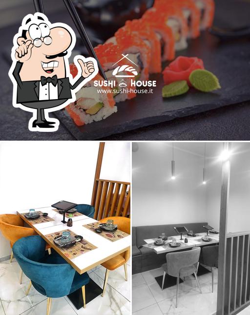 Guarda la immagine che presenta la interni e cibo di Sushi House Fiumicino