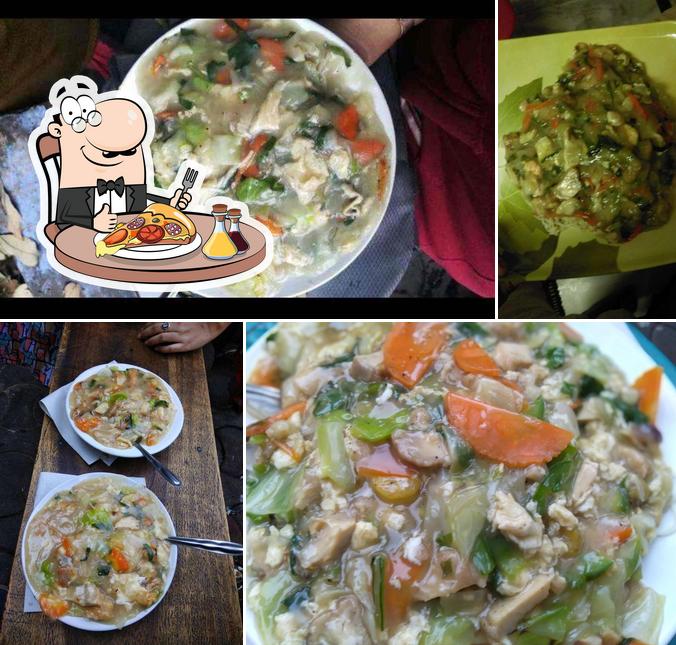 Get pizza at Tripti Snacks Bar