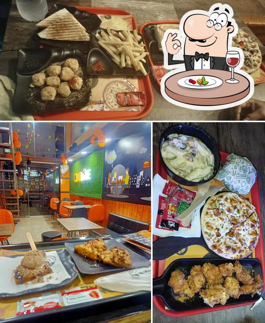 The image of One Bite Cafe Ratnagiri’s food and dining table