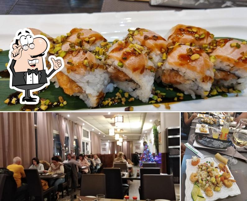 Tra le varie cose da Sushi Queen ristorante giapponese e cinese si possono trovare la interni e cibo