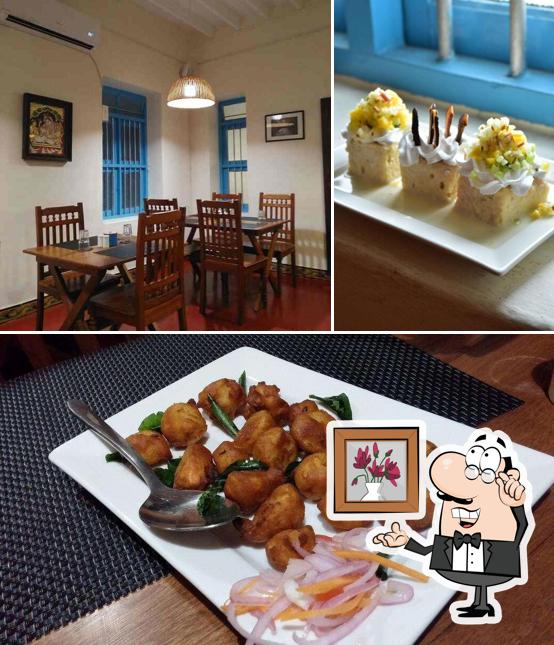 Take a look at the picture depicting interior and food at Mango Tree