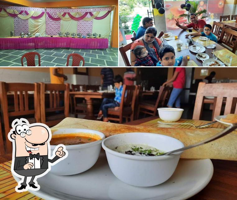 Take a seat at one of the tables at 4 Chef - AIIMS, Rishikesh