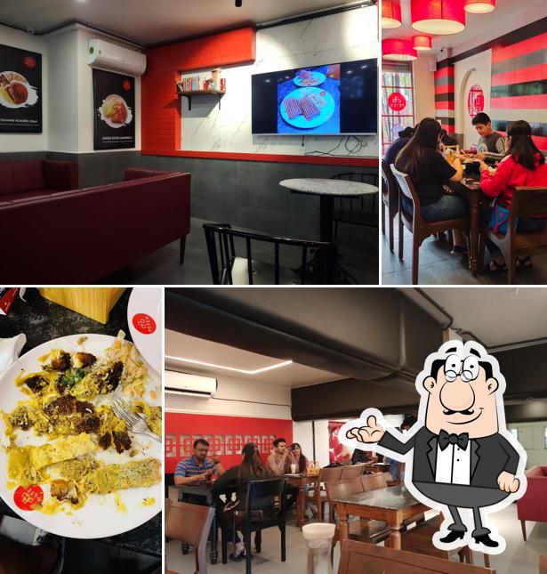 Take a seat at one of the tables at Café PETER