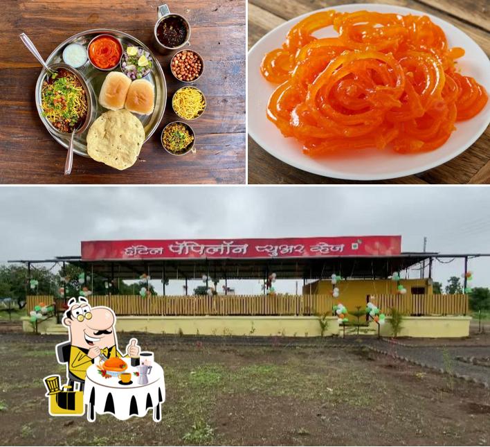 The photo of Hotel Papillon’s food and exterior