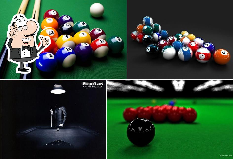 Take a seat at one of the tables at Pool parlour