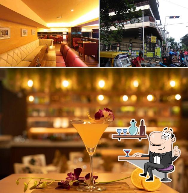Take a look at the image depicting interior and exterior at Back to the Desi Cafe