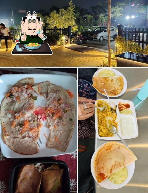 This is the image showing food and exterior at TAAZA TIFFINS