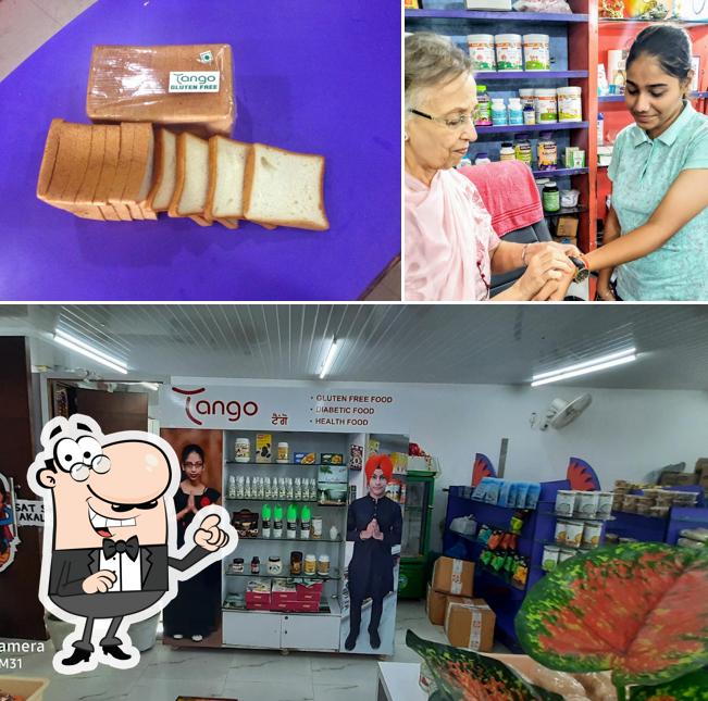 This is the image displaying interior and food at Tango Gluten and Lactose Free Store Amritsar