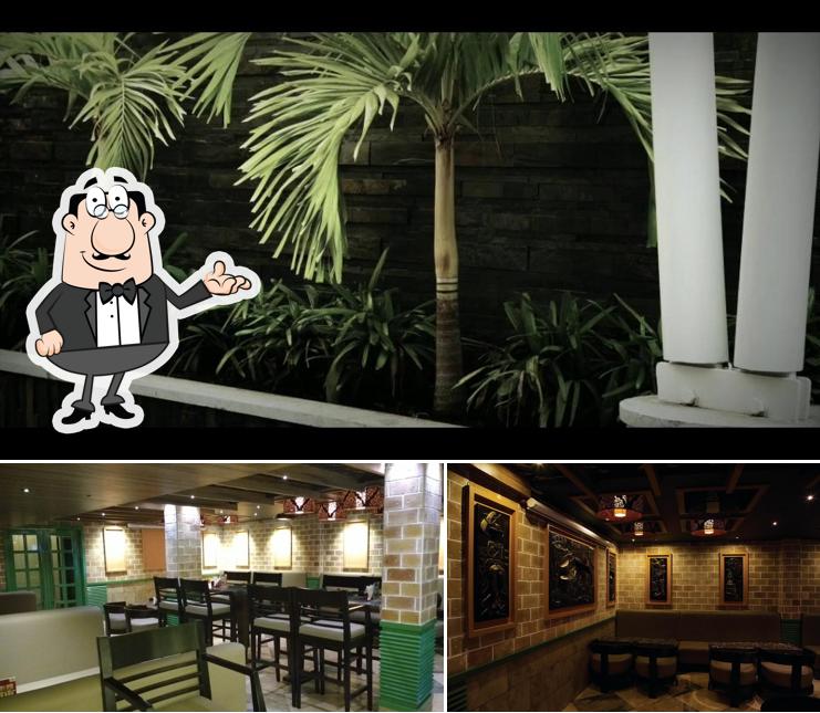 Take a seat at one of the tables at Unicorn Bar