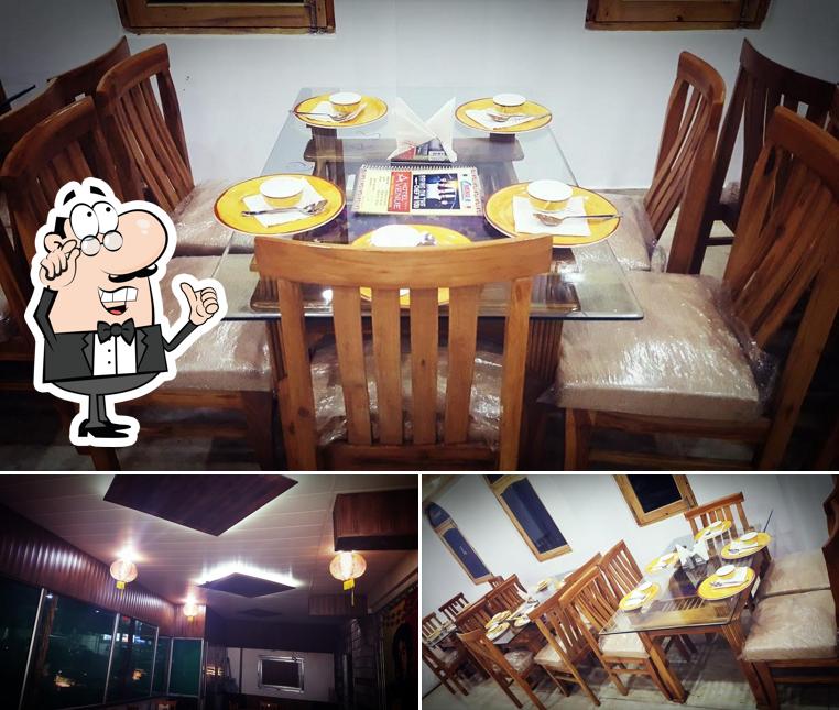 Take a seat at one of the tables at Healing Stone Cafe & Restaurant