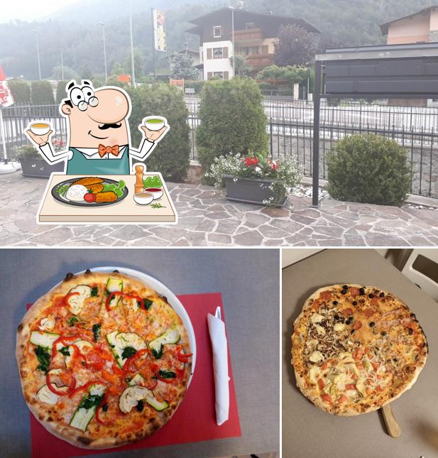 Tra le varie cose da L'angolo della Pizza si possono trovare la cibo e esterno