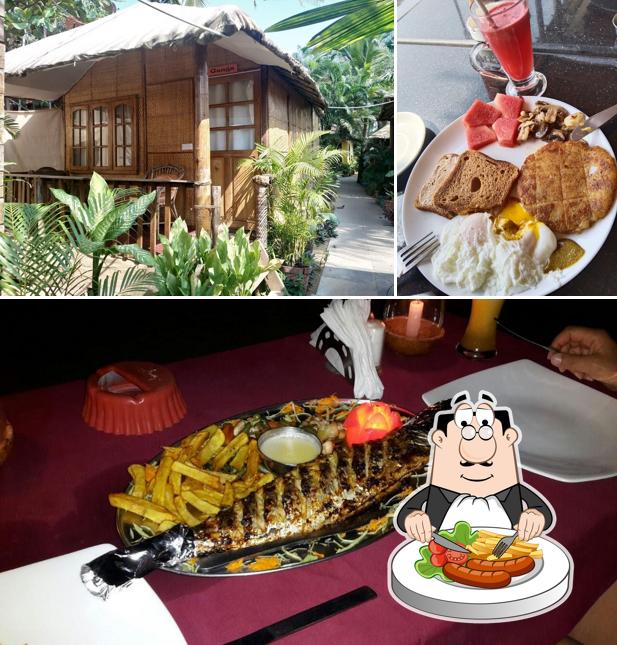 The photo of food and exterior at Namaste Beach Huts and Restaurant