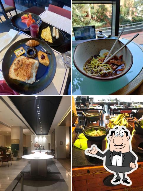 Take a seat at one of the tables at The Square - Multicuisine Restaurant in Chennai