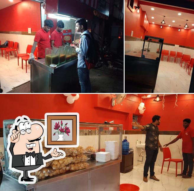 Take a seat at one of the tables at Chaat City