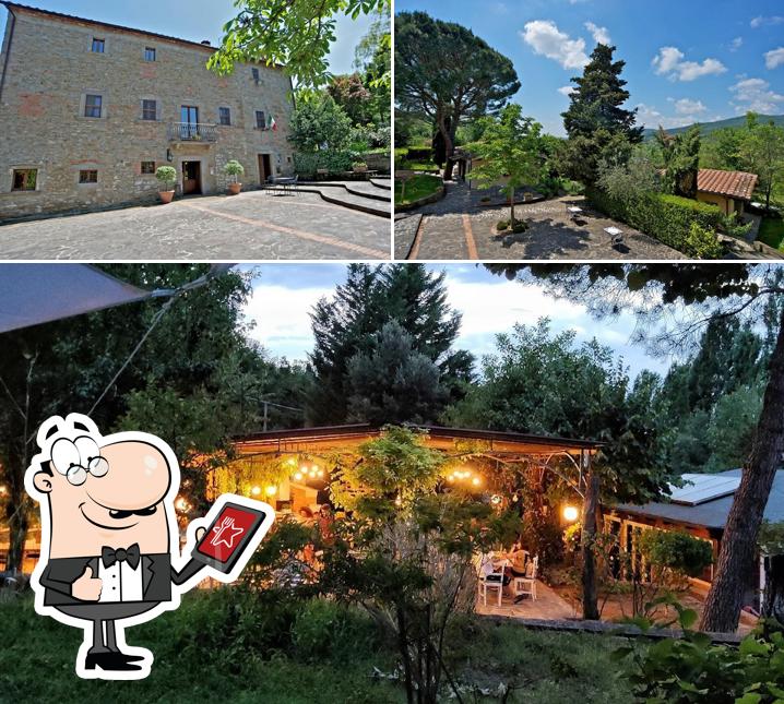 Puoi goderti l'aria fresca da seduto all'esterno di Agriturismo Parco Fiorito