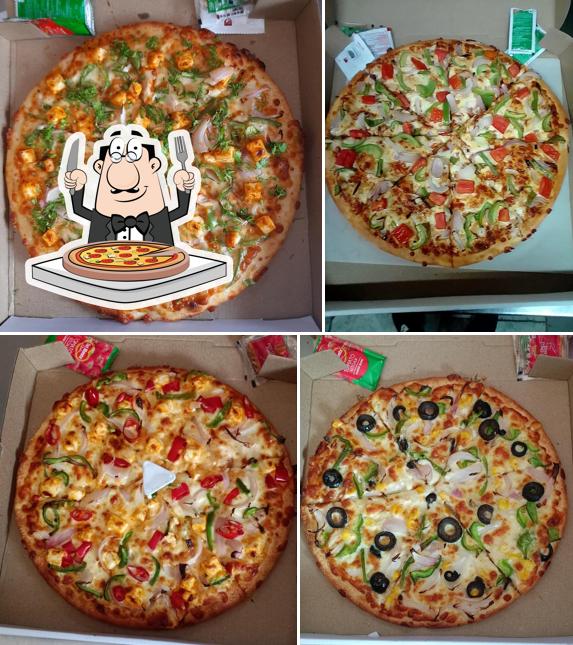 Pick pizza at Cheesy Dreams cafe