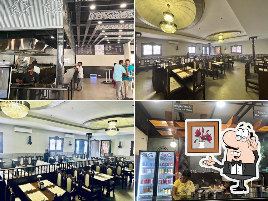 Check out how Madhu's Cafe Madhu’s Fine Dine in Pure veg Kakinada's looks inside
