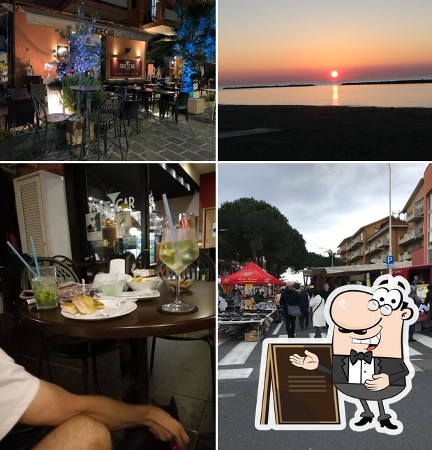 La foto di esterno e interni da Sidecar Café