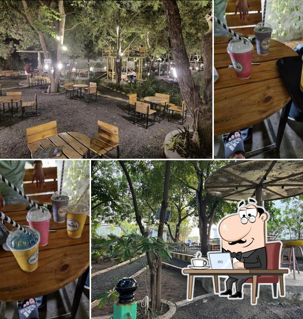 Take a seat at one of the tables at Cha Vala The Drive in Cafe