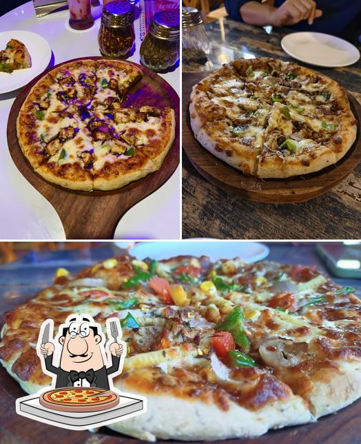 Get pizza at The Blue Moon