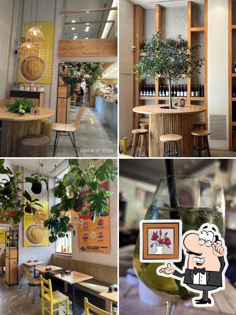 Dai un'occhiata agli interni di CUMA Natural Bar & Fresh Market