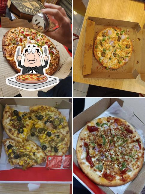 Pick pizza at One oven