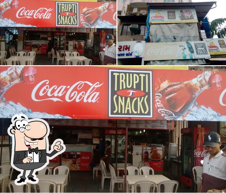 Take a seat at one of the tables at Trupti Snacks Gandevi