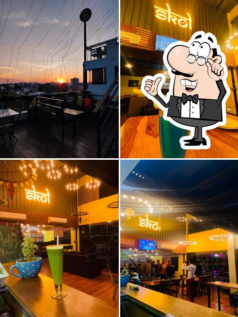Take a seat at one of the tables at SKOL Rooftop Cafe - Best Cafe in Jodhpur - Best Rooftop Restaurant in Jodhpur