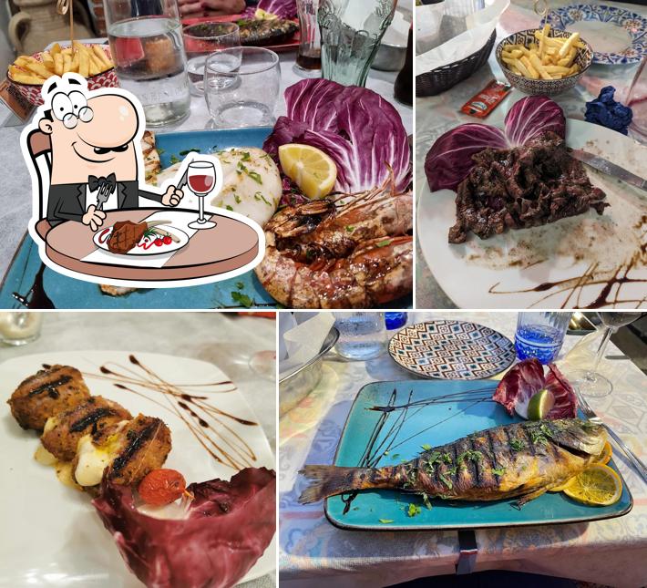 Prenditi i un pasto a base di carne a Trattoria U Fucularu