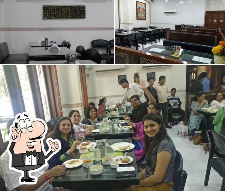 Take a seat at one of the tables at Dakshinayan