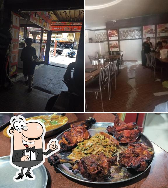 This is the image displaying interior and pizza at VAISHALI VEG & NON VEG FAMILY RESTAURANT