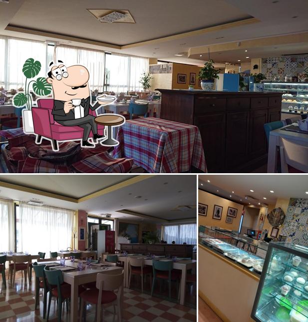 Dai un'occhiata agli interni di Ristorante Pizzeria Lo Scugnizzo