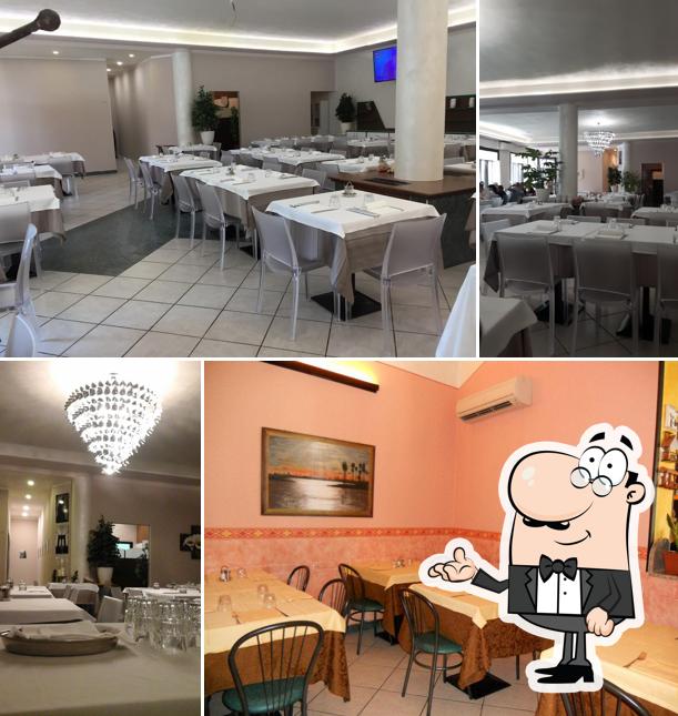 Dai un'occhiata agli interni di Ristorante Pizzeria al Catenaccio