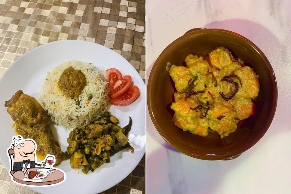 Piatti di carne vengono serviti a Bangla Flavour
