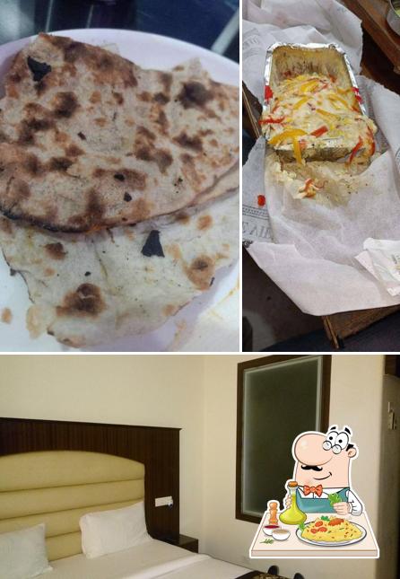 Check out the image depicting food and interior at Hotel Castle View