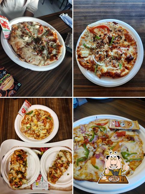 Try out pizza at The Slice